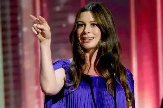 Anne Hathaway Stuns in Purple Cape Gown While Pregnant at Disney Legends Awards 2026