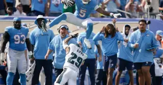 Eagles Survive Heat and Defensive Lapses to Beat Titans 24-20
