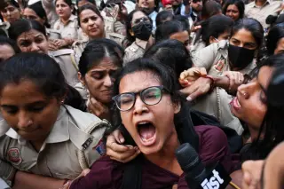 Youth Activists Wave Flags in Delhi as Protests Against Election Chief Escalate