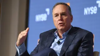 American Express Cuts 5% of Staff to Streamline Operations for AI Integration