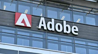 Adobe beats estimates, lifts outlook as AI momentum fuels growth amid leadership shifts