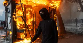 France Confronts Unprecedented Riots: 1,800 Arrested as Macron Prepares National Address