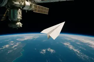 ISS Origami: The Curious Descent of a Four-Gram Paper Plane