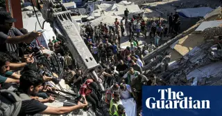 Gaza building collapse kills 16 as displaced residents trapped in rubble