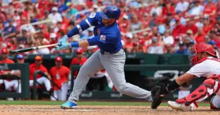 Bregman, Happ deliver late in 10th to lift Cubs past Cardinals