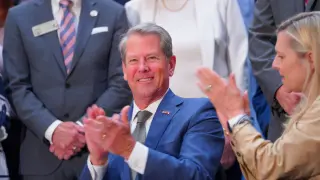 Kemp signs sweeping Georgia tax cuts with local property relief