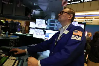 Oil dips as inflation sticks, fueling tech stocks rally on AI optimism