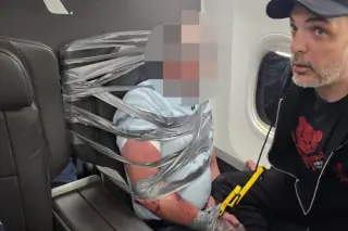 Disruptive flyer restrained with duct tape as flight diverts to BWI for emergency landing