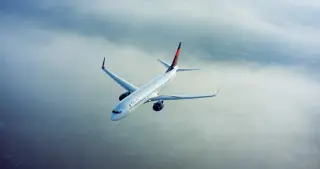 Delta's Record Revenue Masked by Fuel Costs, Leading to Sharp Profit Cut