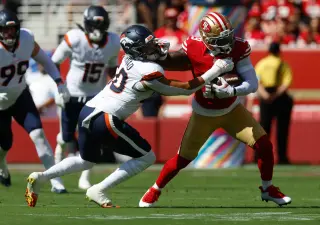 Kittle's 56-yard sprint seals 49ers' 4-0 start as Shanahan surpasses Walsh
