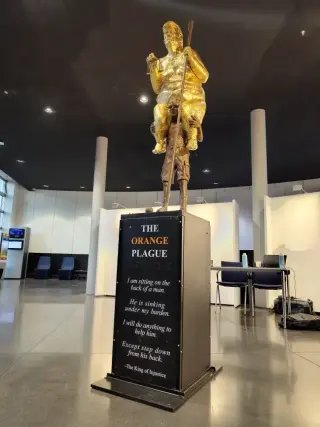 Danish Artist Unveils Gold-Leaf Nude Trump Statue in European Parliament