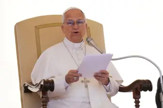 Pope urges wealthy U.S. Catholics to keep funding charity