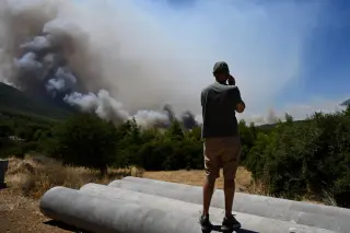 Photos document Greece wildfires as blazes ripple across Europe and the United States