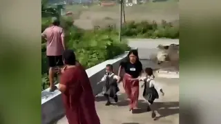 Woman and two children narrowly escape Nepal flash floods amid massive rescue effort
