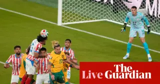Socceroos reach World Cup last 32 after goalless finish with Paraguay