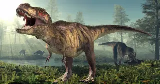 Strong jaws, not bigger bodies, drove giant theropods to shrink their forelimbs