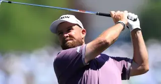 Lowry's 190-yard ace lifts him into a share of second at the 90th Masters