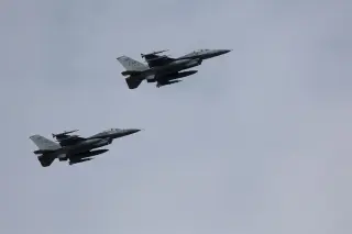 Lawrence preps for pregame military flyovers before KU season opener