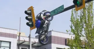Motorcycle left hanging from Delta traffic light after Scott Road crash