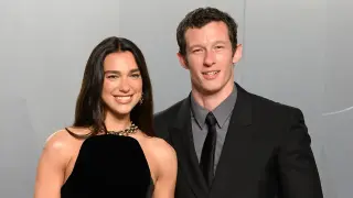 Dua Lipa flaunts abs on Italian honeymoon with Callum Turner