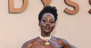 Lupita Nyong’o Dons Golden Goddess Vibe for Odyssey Premiere