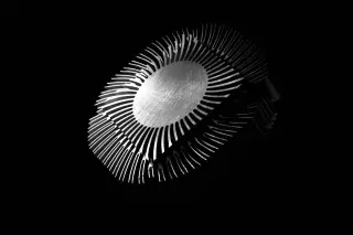 Tiny permanent-magnet shields may trim deep-space radiation dose