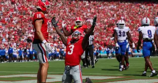 Georgia rolls in heat, routs Tennessee State 63-3 to start season
