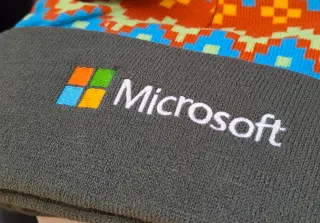 Microsoft launches first voluntary retirement program with cash, health coverage, and vesting protections