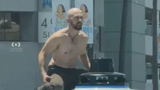 Shirtless man vandalizes Waymo in East Hollywood as traffic grinds to a halt