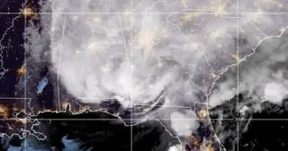 Isaias hits Gulf Coast as Category 2, brings record-breaking late-season surge