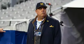 Michigan's Warde Manuel to Step Down Amid Internal Probes and Penalties