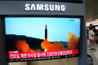 Pyongyang launches 700km missile after Seoul demands apology for mine injuries