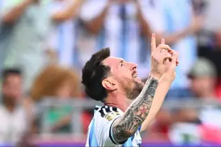 Messi’s hat-trick lights up Argentina’s World Cup opener against Algeria