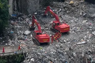 Rescuers race to find survivors after Chongqing-area landslide