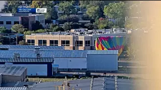 Fiesta Balloon Strikes Power Lines Near Journal Center; Suspect Killed in NMSP Ride-Along
