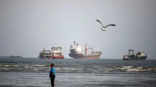 Hormuz vessel hit as Oman talks stall and oil spikes