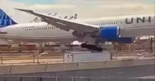 First officer warns captain: slow and a little low as United 169 clips NJ light pole