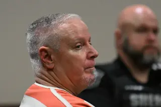 Georgia father gets 15 years for supplying gun in son's school shooting