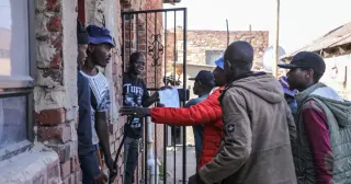Door-to-door raids fuel fear as South Africa's anti-immigrant protests escalate