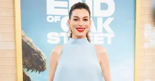 Anne Hathaway Flaunts Growing Baby Bump in Bold Red-Carpet Ensemble