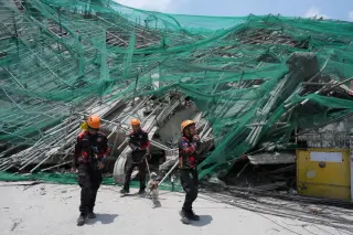Photos Capture the Aftermath of a Philippines Building Collapse