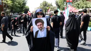 Iran's supreme leader under wraps as president says contact is 'very difficult'
