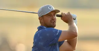 DeChambeau penalized two strokes for improving lie at 2026 Open, reshaping the leaderboard