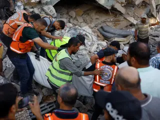 Six-story Gaza City collapse leaves 20 dead, about 100 feared trapped