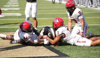 NC State’s Historic Collapse: Doeren Defends Safety Call Amid Job Security Concerns