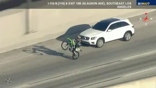 Dirt bike riders spark tense LA chase as stolen SUV weaves through city streets and the 110 Freeway