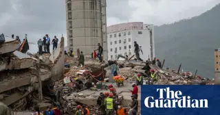 Venezuela's amateur 'moles' wade into quake rubble to save lives
