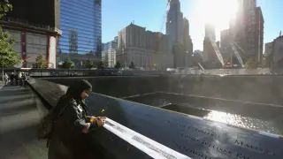 New York marks 9/11 anniversary as Trump skips ceremony and first Muslim mayor attends