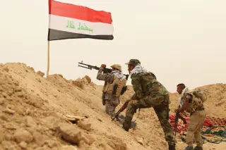 Iraq confronts twin deadlines: U.S. exit and militia disarmament