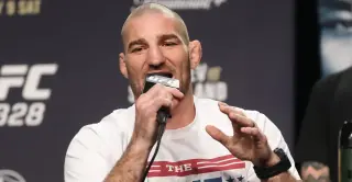 Strickland pivots to ally, urges Bud Light to back Dustin Poirier